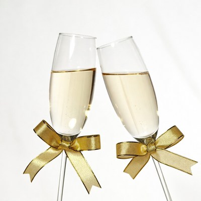 Two Champagne Glasses with Gold Bows