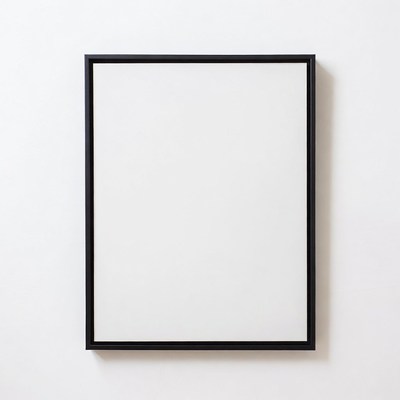 Empty black picture frame on white wall
