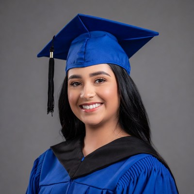 Latina woman in blue graduation gown