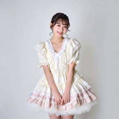 Asian woman in white lace dress