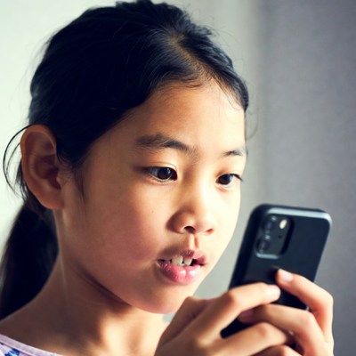 Asian girl using smartphone