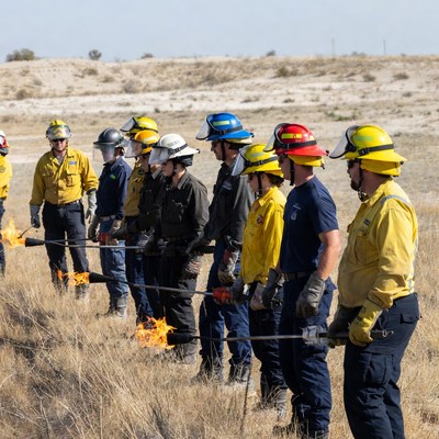 Firefighters training with drip torches