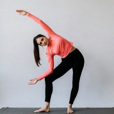 Woman doing yoga side stretch