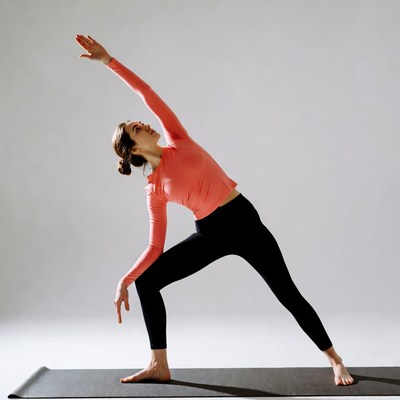Woman doing yoga warrior pose