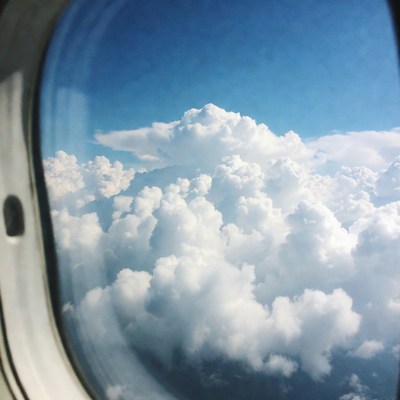 Airplane Window Clouds View