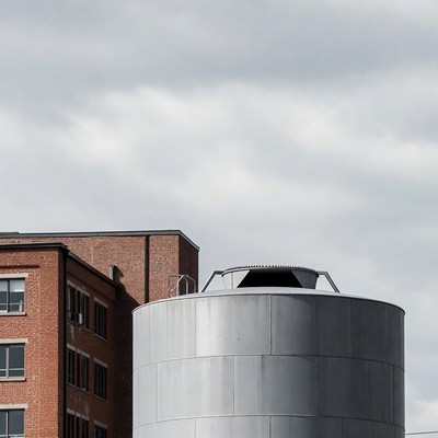 Silver Water Tank Brick Building