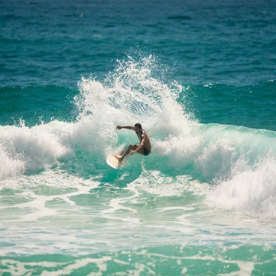 Man surfing on ocean wave