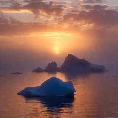 Icebergs in Sunset Arctic Waters