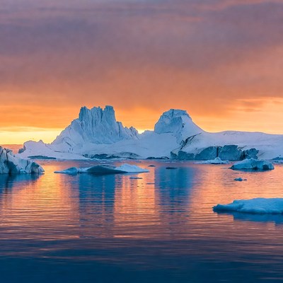 Icebergs in Arctic Sunset Reflection