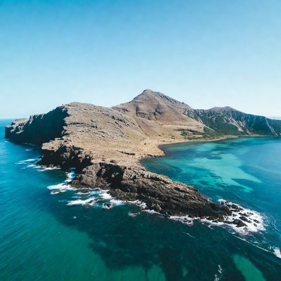 Small rocky island turquoise ocean