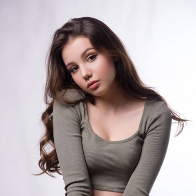 Young woman in green crop top