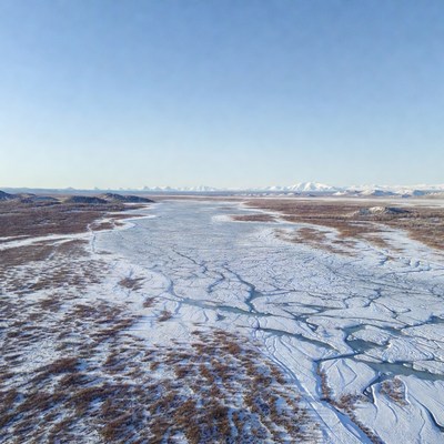 Frozen River in Snowy Tundra