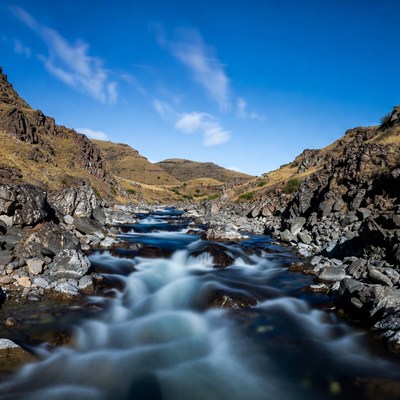 River flowing through rocky canyon