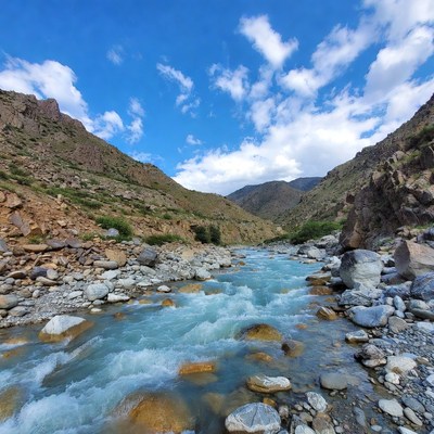 Turquoise River in Mountain Valley