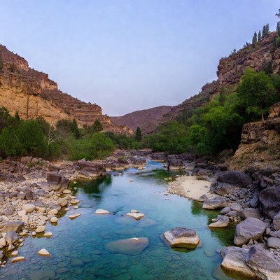 River Flowing Through Canyon