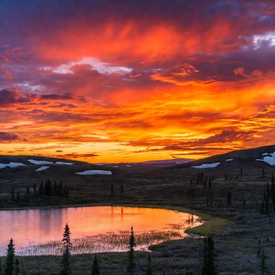 Vibrant Sunset Over Mountain Lake