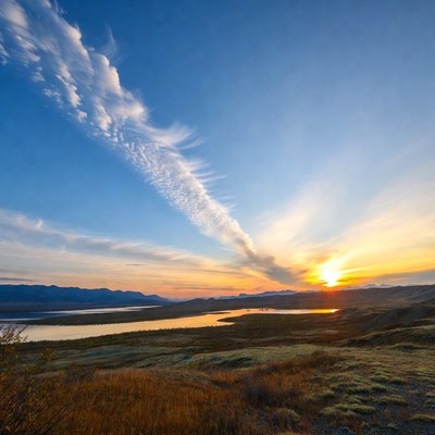 Sunset over lake and mountains