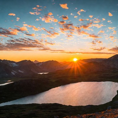 Sunrise over mountain lake