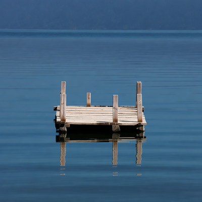 Wooden pier on calm lake