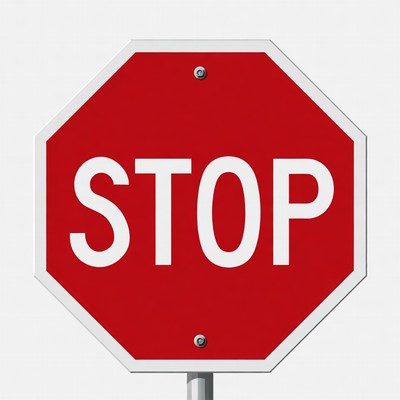 Red stop sign on pole