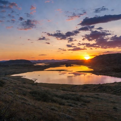 Sunset over mountain lake