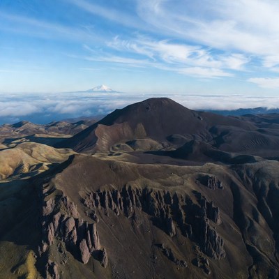 Volcano Peak Above Clouds