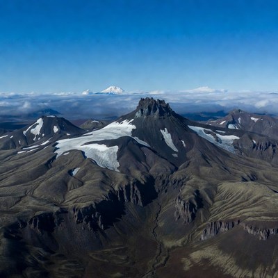 Snowy Volcanic Mountains Aerial View
