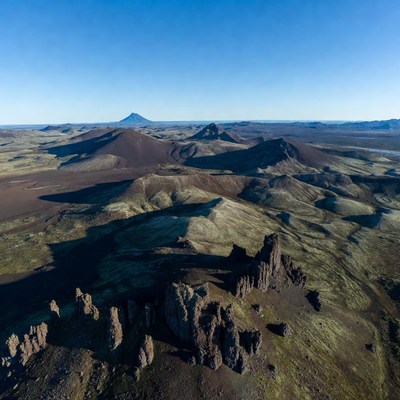 Volcanic Landscape with Mountains and Rugged Rocks