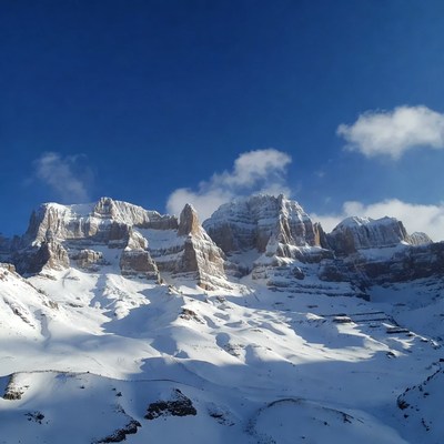 Snowy Jagged Mountains Blue Sky