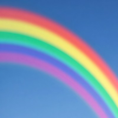 Vibrant Rainbow in Blue Sky