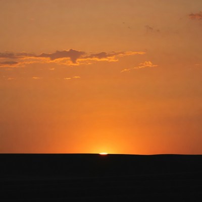 Sunset over flat horizon