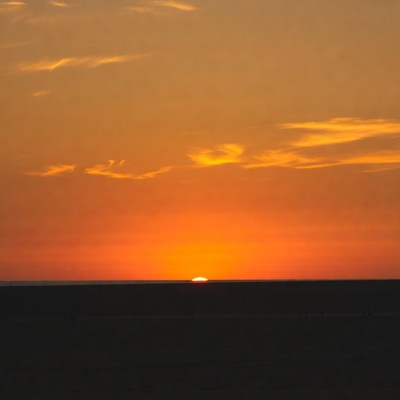 Sunset over dark horizon