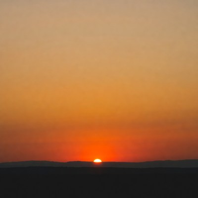 Sunset over distant hills