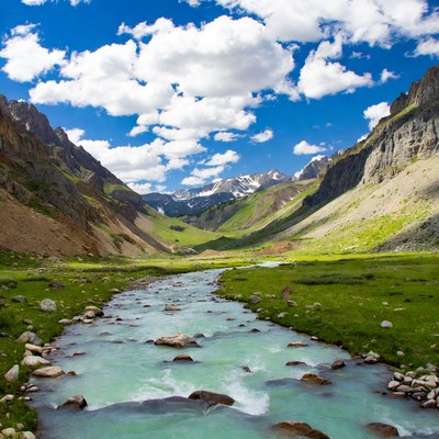 Turquoise River in Mountain Valley