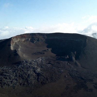 Volcanic Crater with Clouds