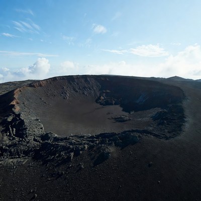 Volcanic Crater with Blue Sky