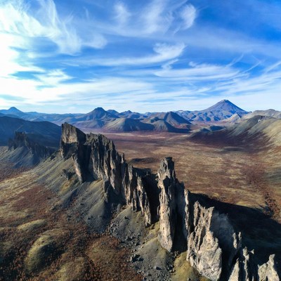 Aerial View of Rugged Mountains and Valley