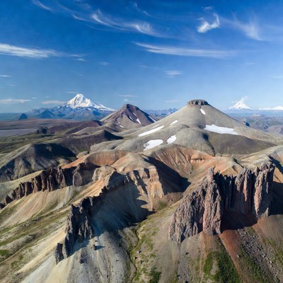Volcanic Mountains with Snow Peaks