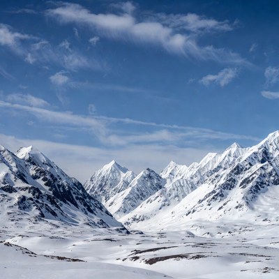 Snowy Mountains Under Blue Sky