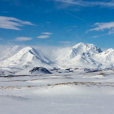 Snowy Mountains Under Blue Sky