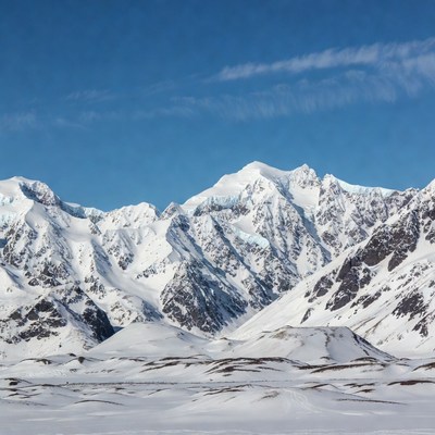 Snowy Mountains Under Blue Sky