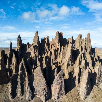 Jagged rock formations under blue sky