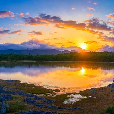 Sunset over mountain lake