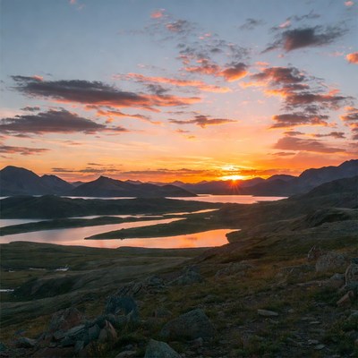 Sunset over mountains and lakes