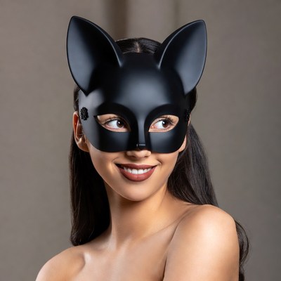Woman wearing black cat mask