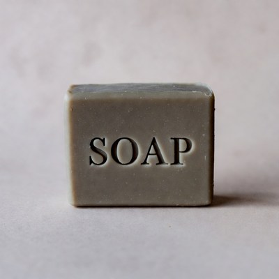 Gray soap bar with SOAPA stamped