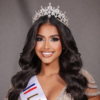 Beauty queen with crown and sash