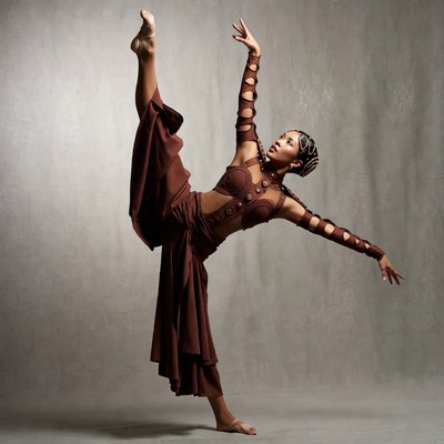African-American woman in ballet split pose