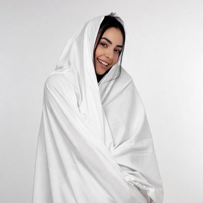 Smiling woman in white hijab