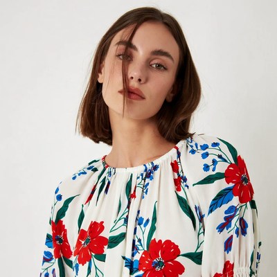Woman in red floral blouse